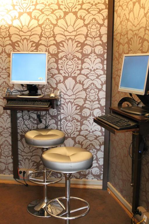 TV a/nebo společenská místnost v ubytování Home Hotel Havnekontoret
