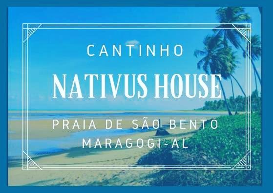 a sign for a natalius house on a beach at Cantinho Nativus in Maragogi