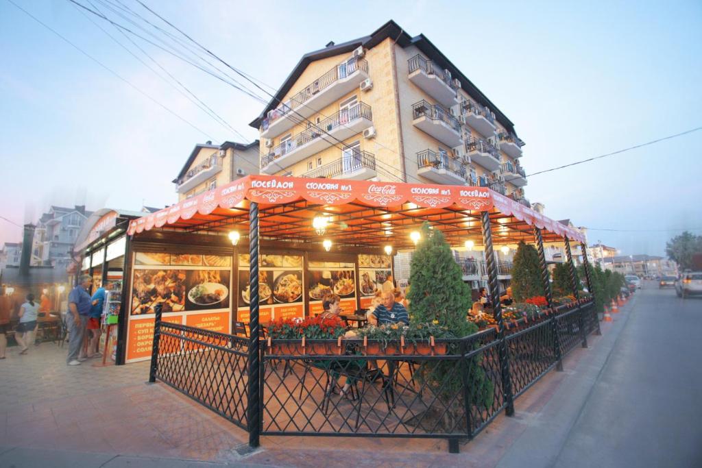 a food stand in front of a building at Посейдон-3, отель in Vityazevo