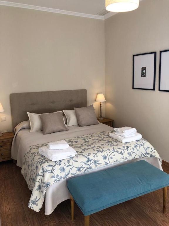Postel nebo postele na pokoji v ubytování Hotel La Muralla