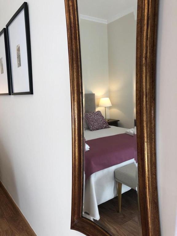 Postel nebo postele na pokoji v ubytování Hotel La Muralla