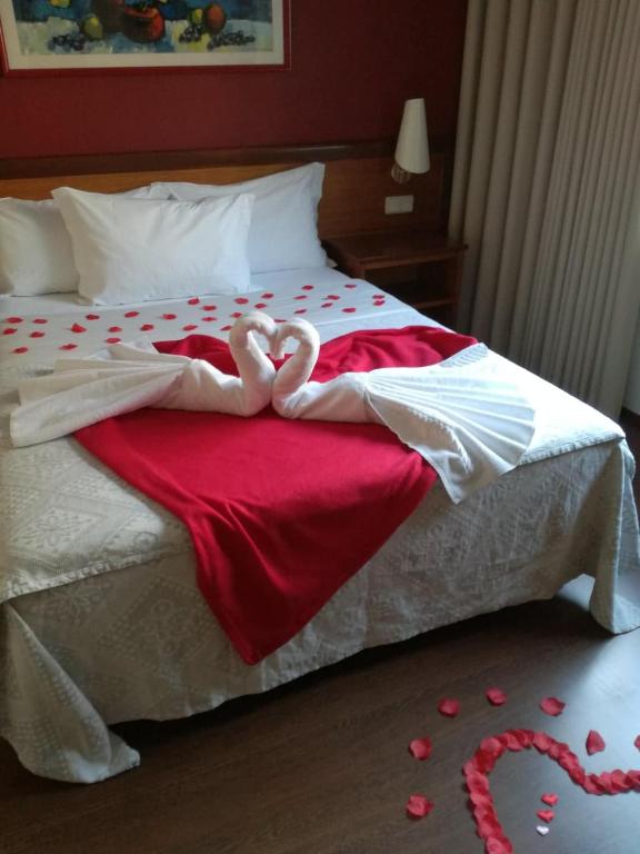 Postel nebo postele na pokoji v ubytování Hotel Dom Vilas