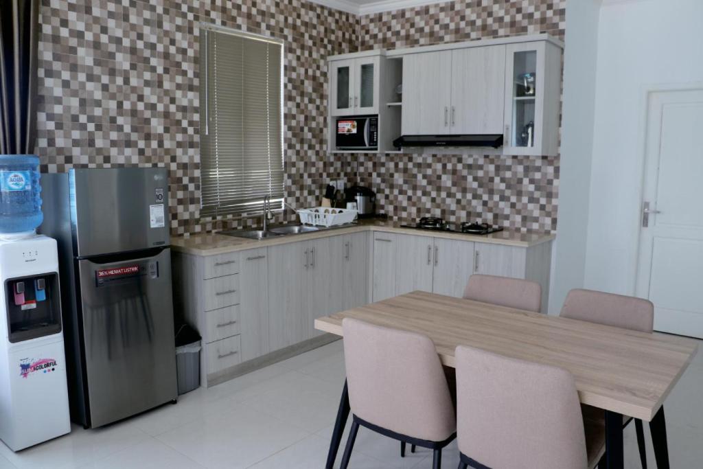 Kuchyň nebo kuchyňský kout v ubytování Diyar Villas Puncak F4/8