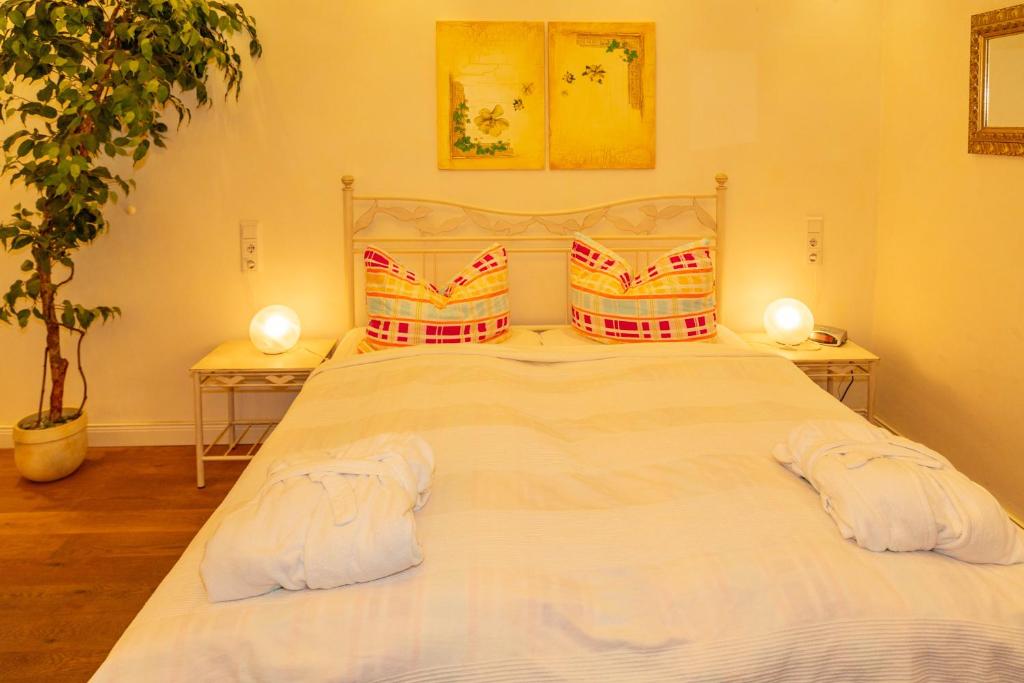 Postel nebo postele na pokoji v ubytování Apartments Wald-Residenz Bansin