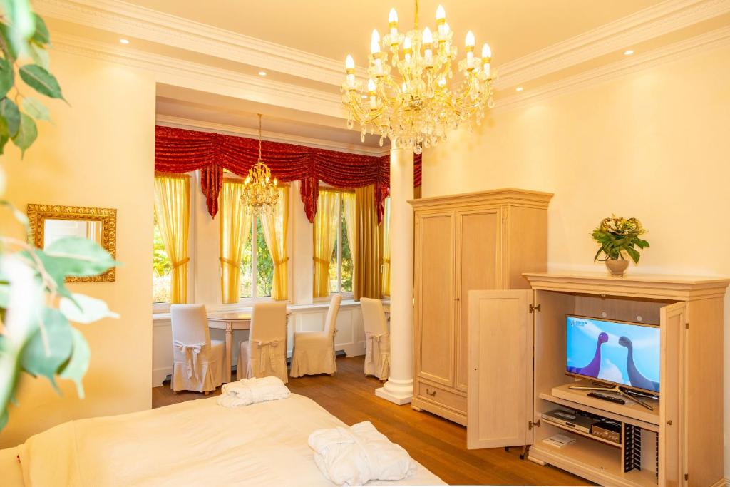 TV a/nebo společenská místnost v ubytování Apartments Wald-Residenz Bansin