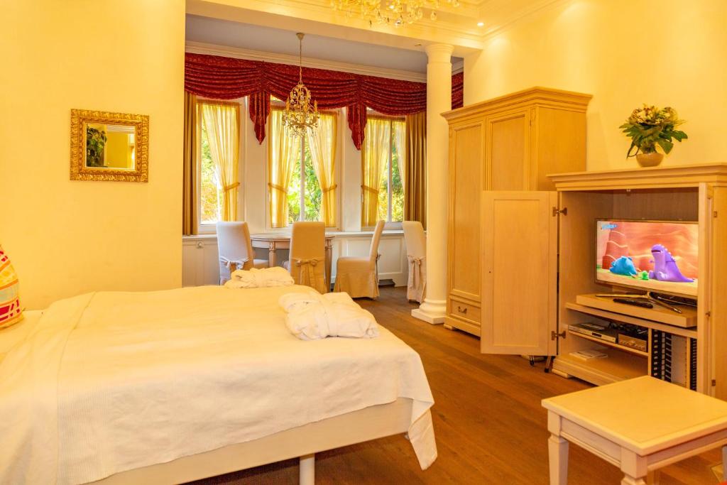 TV a/nebo společenská místnost v ubytování Apartments Wald-Residenz Bansin