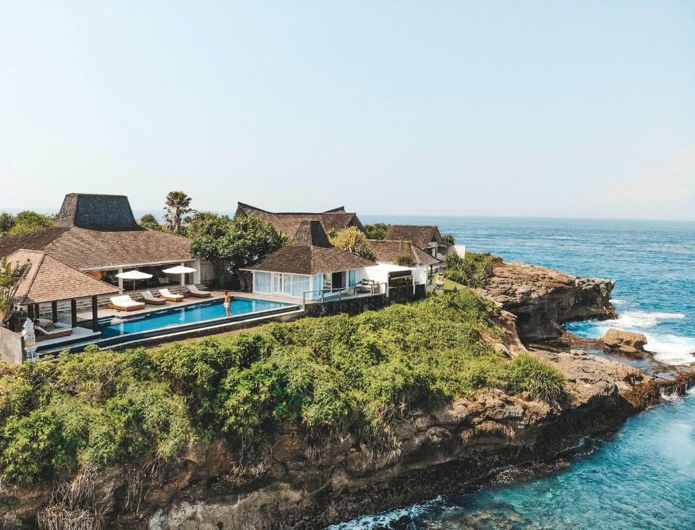 an aerial view of a house on a cliff at Villa Tranquilla in Nusa Lembongan