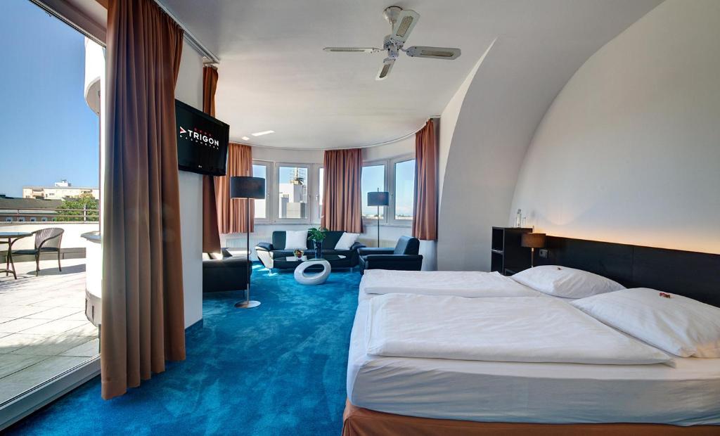 Voodi või voodid majutusasutuse Skycity Hotel Atrigon toas