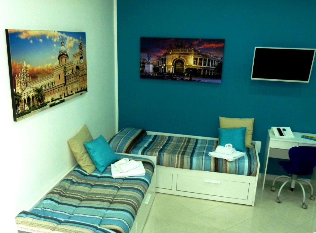 A bed or beds in a room at Casa Principe Maqueda