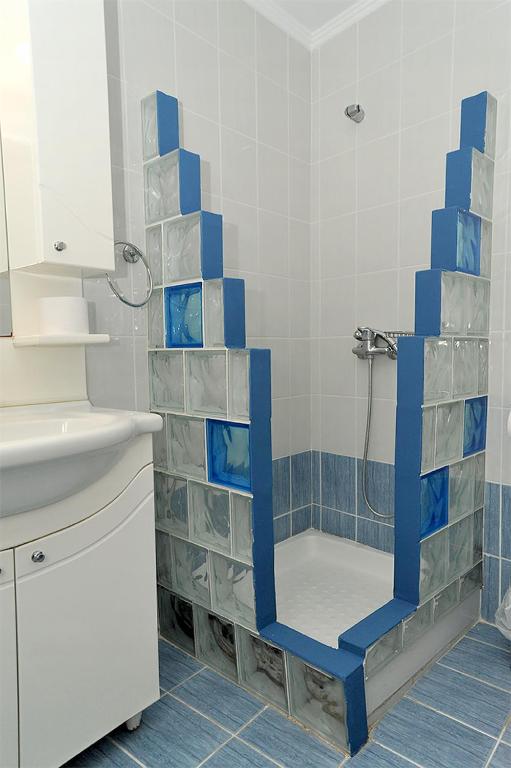 Koupelna v ubytování Hotel Pelagos Studios