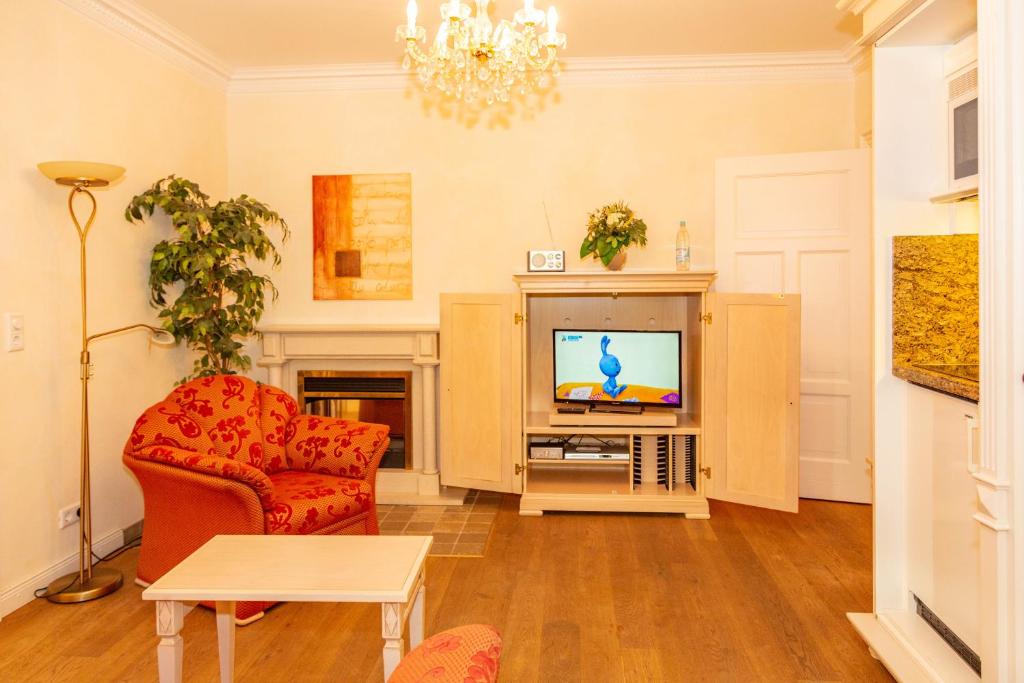 TV a/nebo společenská místnost v ubytování Apartments Wald-Residenz Bansin