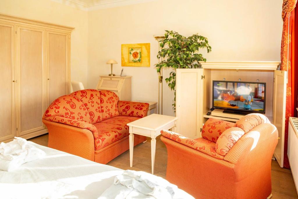 TV a/nebo společenská místnost v ubytování Apartments Wald-Residenz Bansin