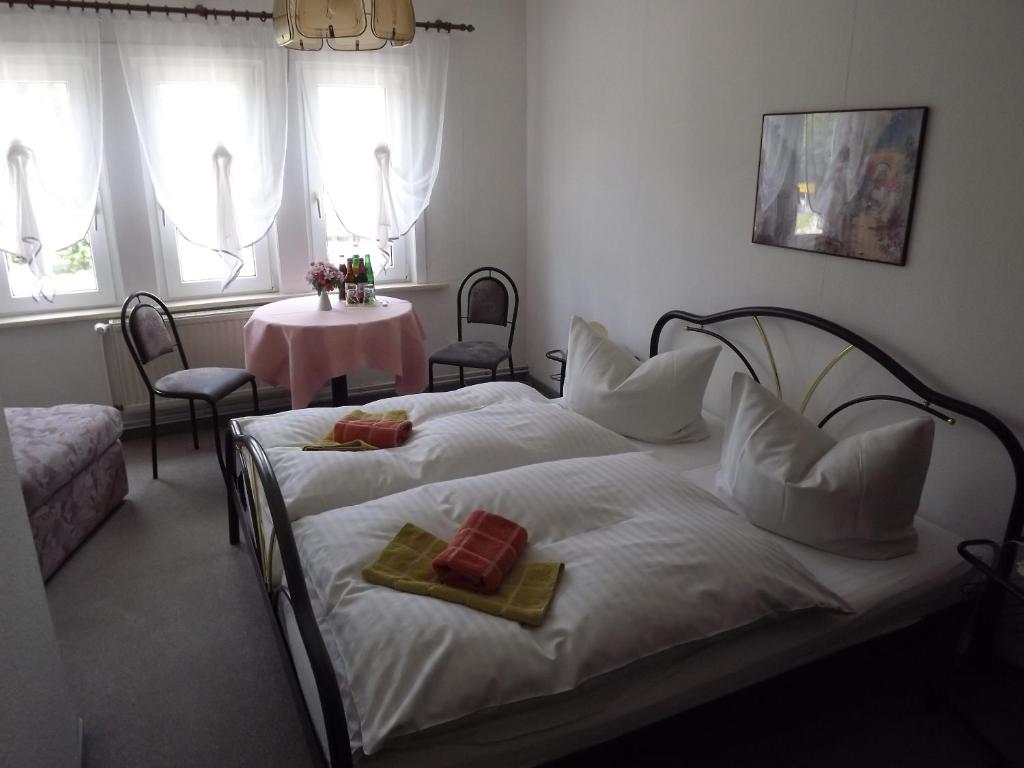 Postel nebo postele na pokoji v ubytování Pension Bodetal