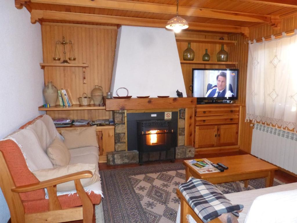 Televízia a/alebo spoločenská miestnosť v ubytovaní Casa Rural Castellanos