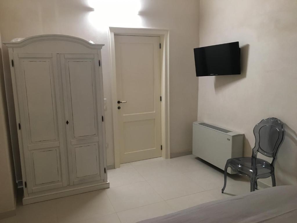 TV a/nebo společenská místnost v ubytování Casa Magadè B&B