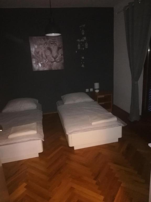 Postel nebo postele na pokoji v ubytování Apartmani Marin