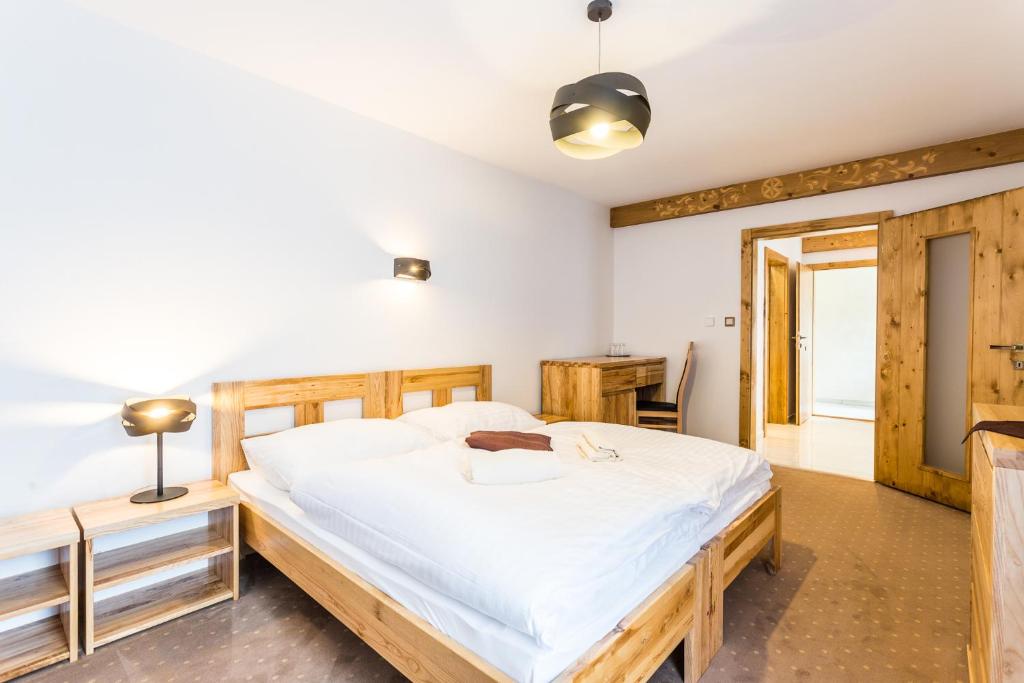 Postel nebo postele na pokoji v ubytování Hotel Palatín