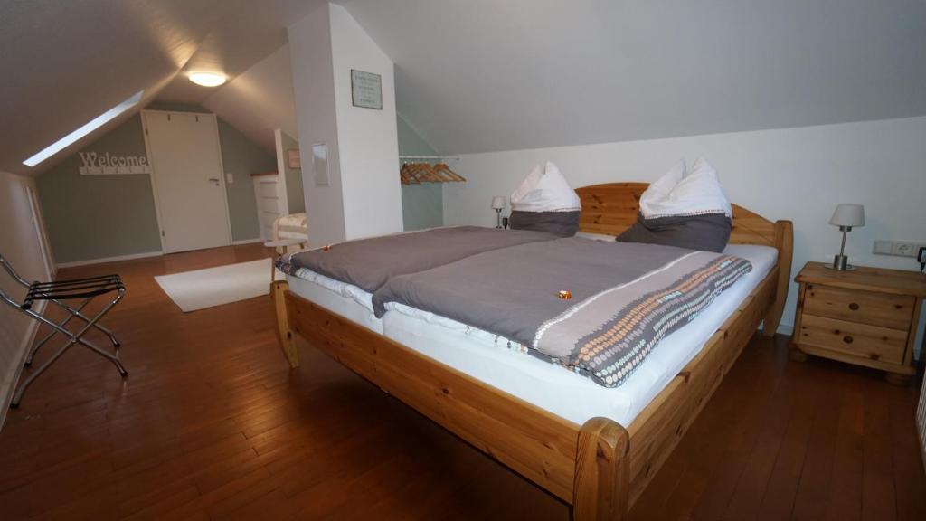 Postel nebo postele na pokoji v ubytování Ferienhaus am Rehberg