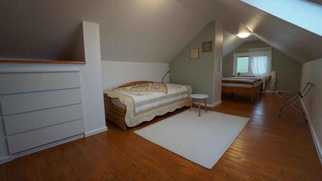 Postel nebo postele na pokoji v ubytování Ferienhaus am Rehberg