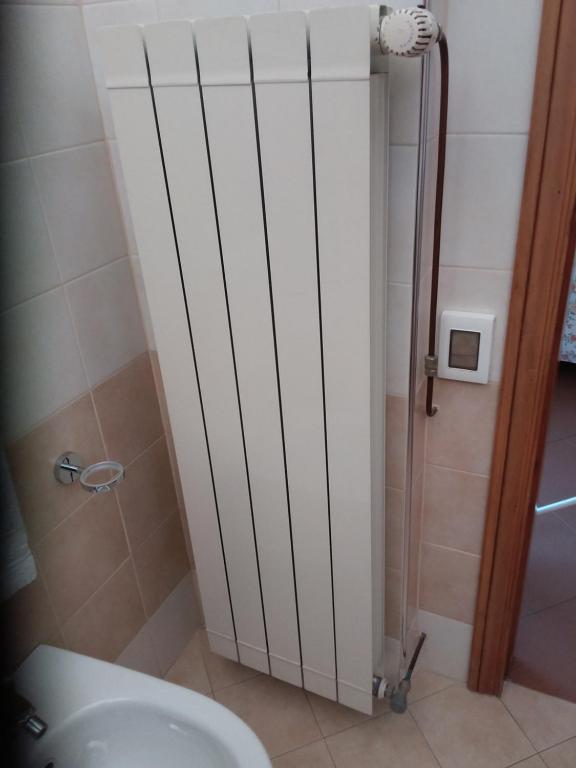 Koupelna v ubytování Albergo Nyers
