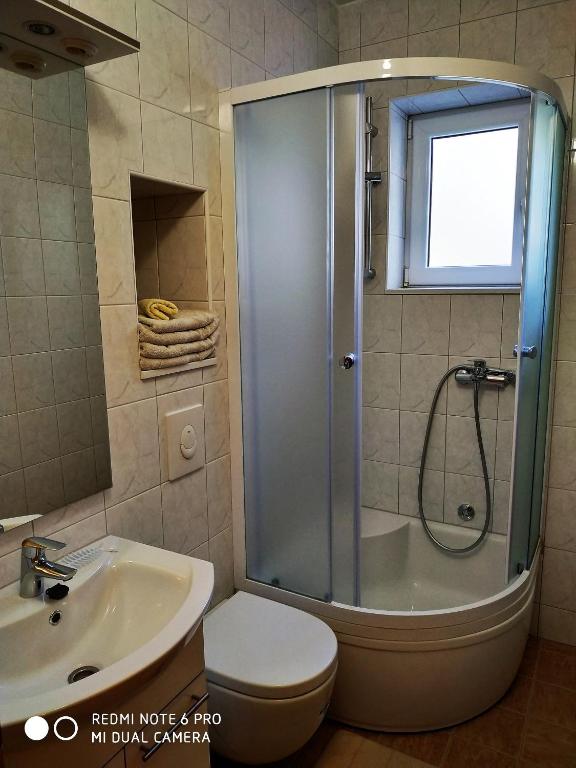 Koupelna v ubytování Apartment Bernarda