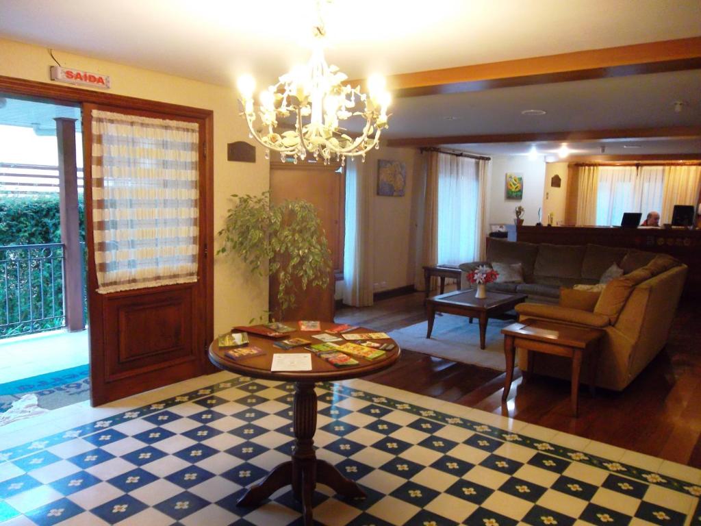 Posezení v ubytování Pousada Joia da Serra by Hotel Platanus
