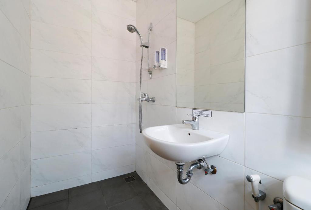 Koupelna v ubytování Vansari Hotel
