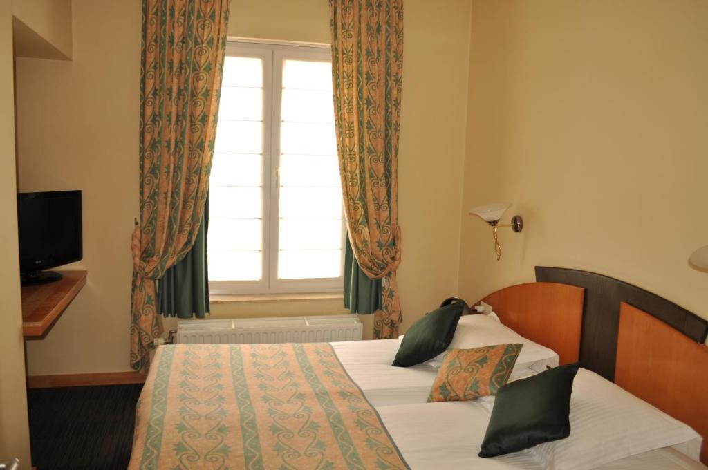 Postel nebo postele na pokoji v ubytování Hotel Moby Dick by WP hotels