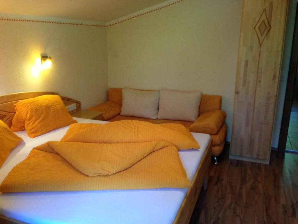 Posteľ alebo postele v izbe v ubytovaní Appartements am See