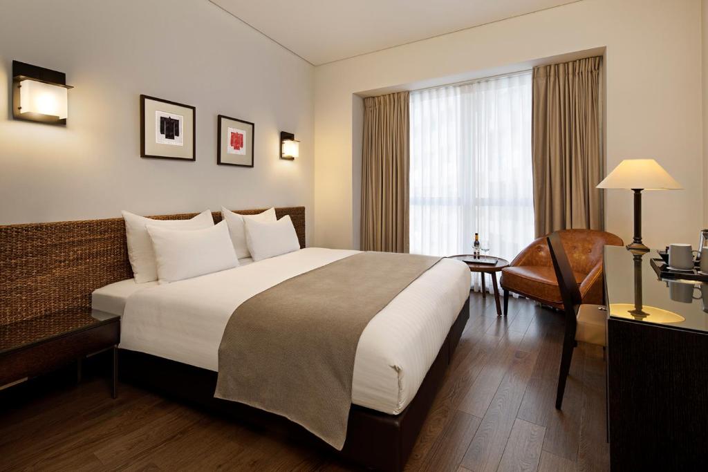 Postel nebo postele na pokoji v ubytování Vital - Urban boutique hotel TLV