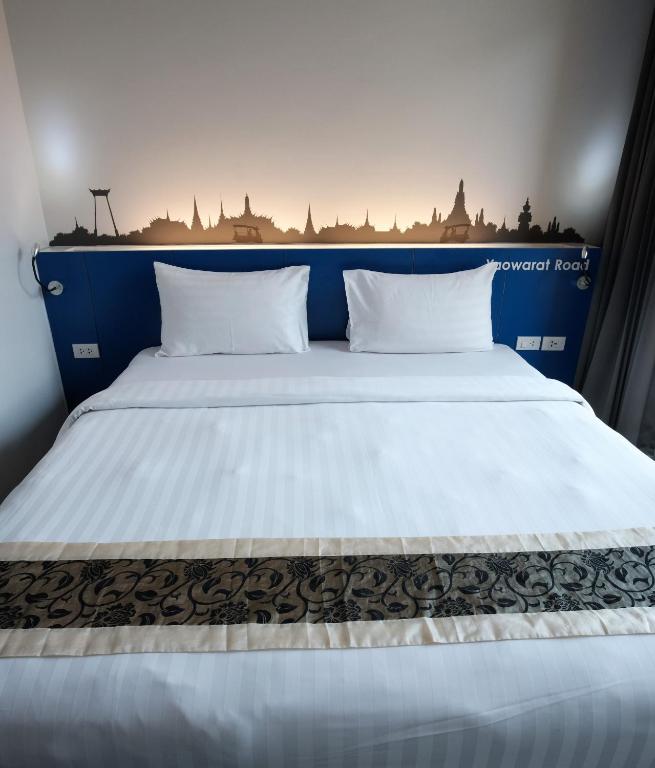 Postel nebo postele na pokoji v ubytování iSanook Bangkok