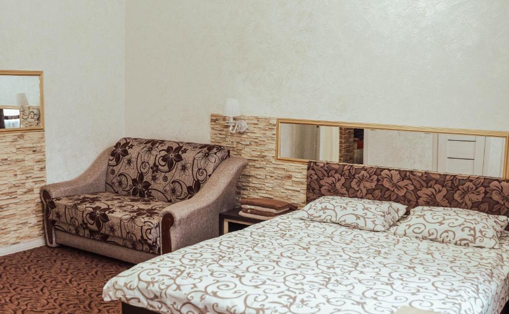 Postel nebo postele na pokoji v ubytování Hotel Rafinad