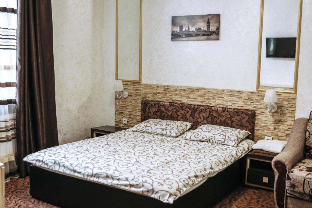 Postel nebo postele na pokoji v ubytování Hotel Rafinad
