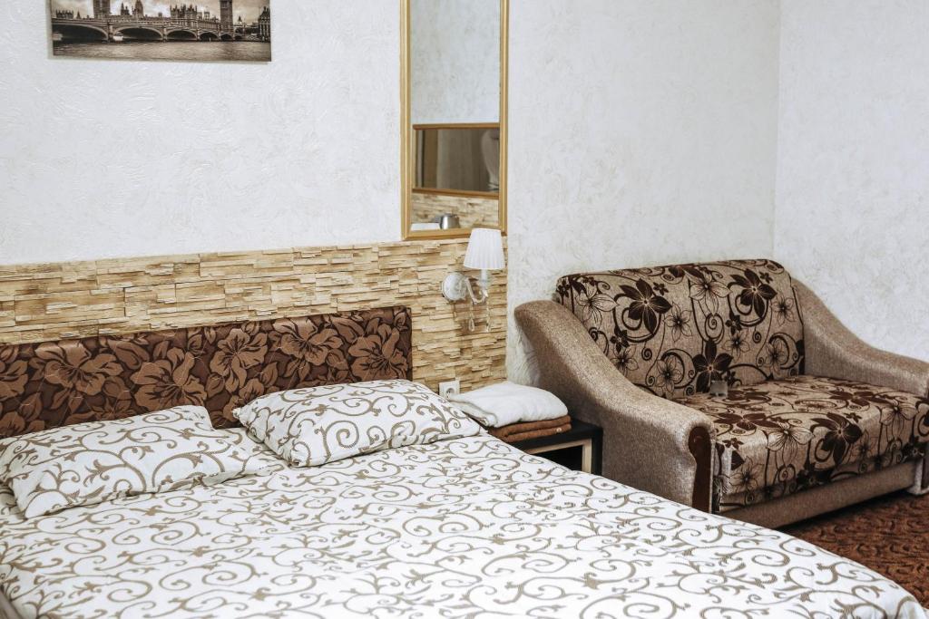 Postel nebo postele na pokoji v ubytování Hotel Rafinad