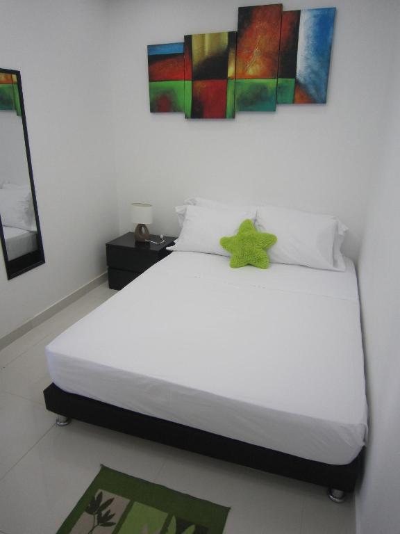 Postel nebo postele na pokoji v ubytování Hotel Valmar