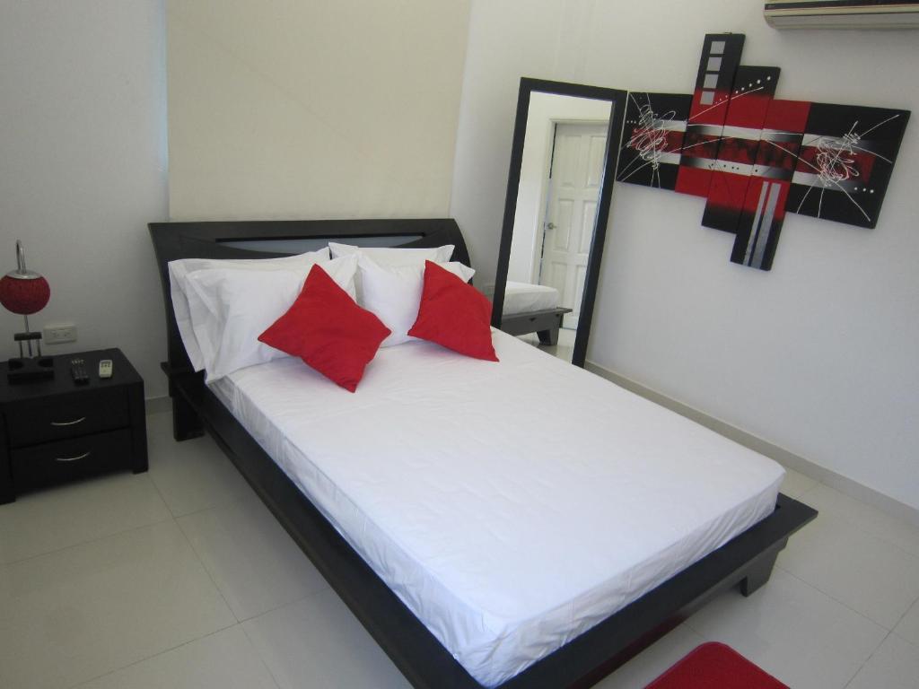 Postel nebo postele na pokoji v ubytování Hotel Valmar