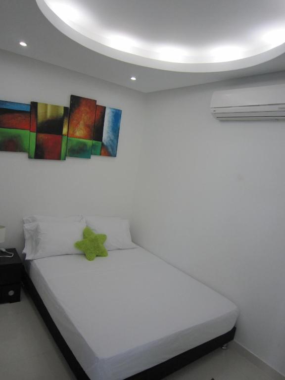 Postel nebo postele na pokoji v ubytování Hotel Valmar
