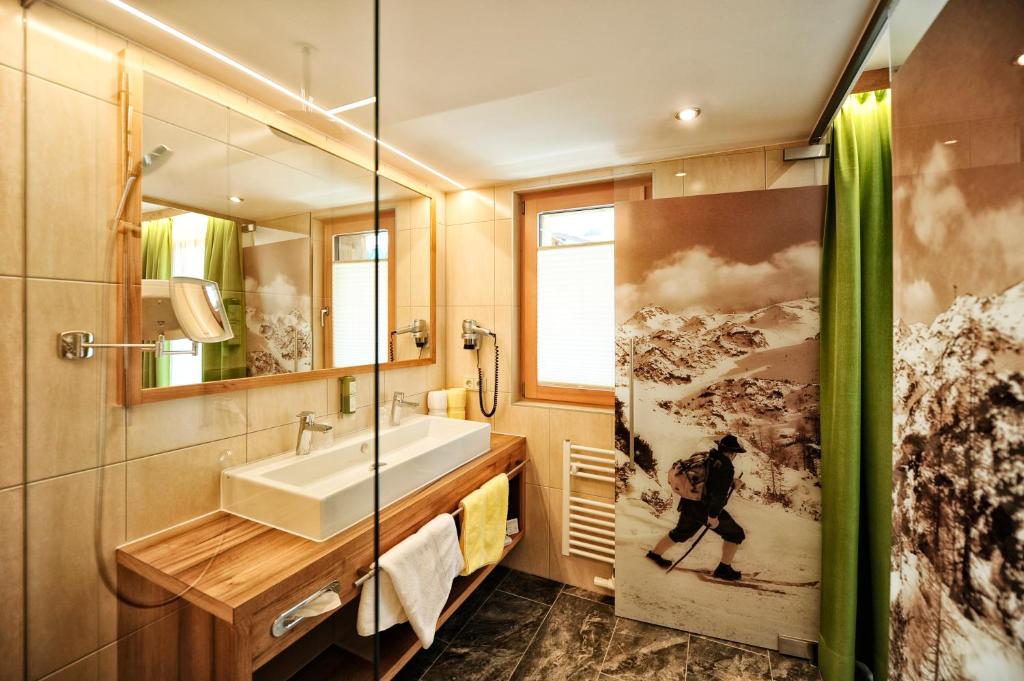 Koupelna v ubytování Hotel Arnika