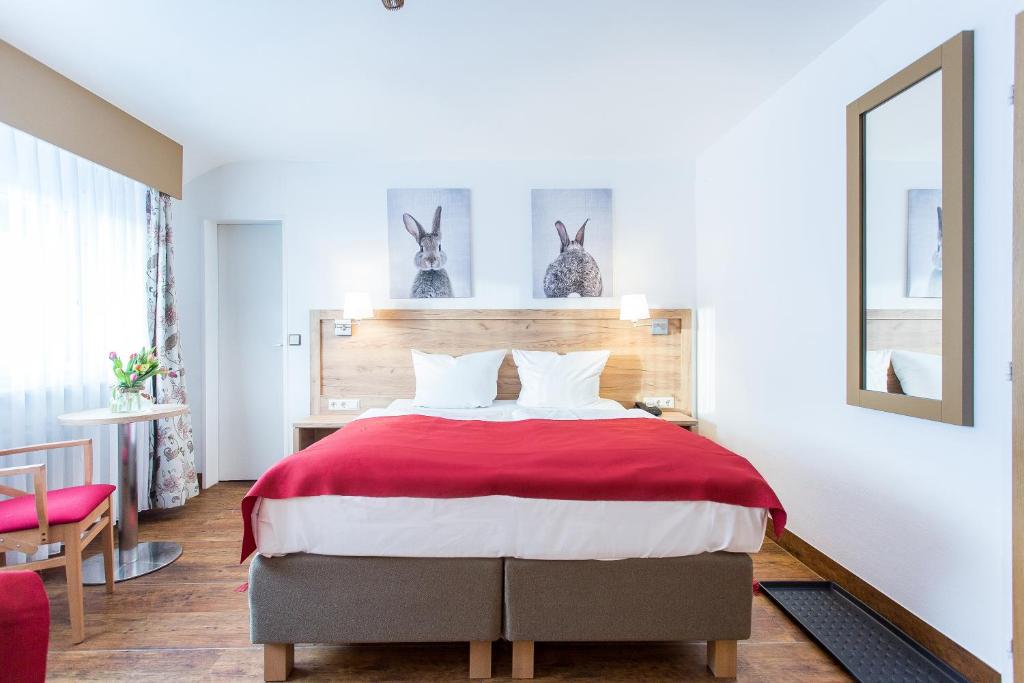Postel nebo postele na pokoji v ubytování Hotel Diana