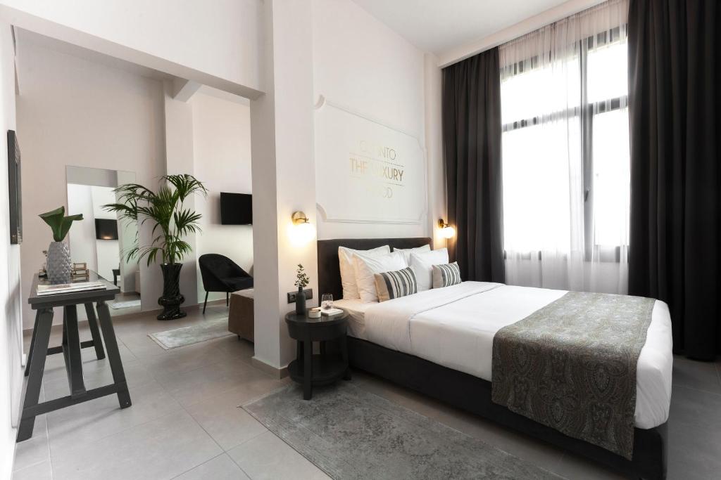 Postel nebo postele na pokoji v ubytování The Mood Luxury Rooms