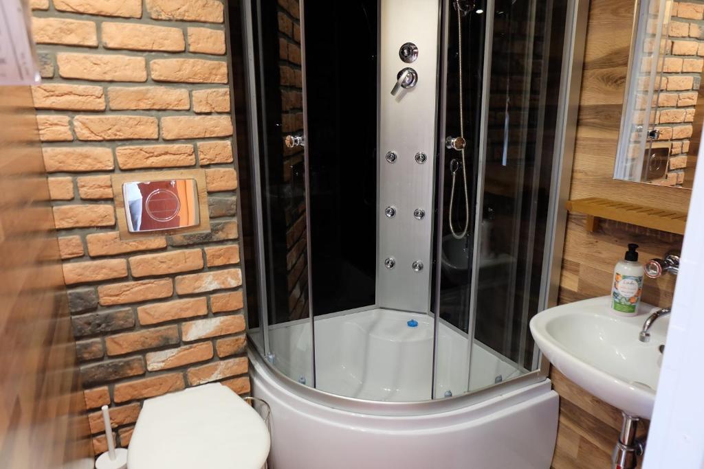 Kúpeľňa v ubytovaní Willa Pod Aniołem - Pokoje Gościnne & Apartamenty z widokiem na góry