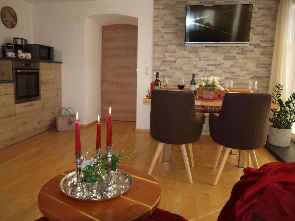 TV a/nebo společenská místnost v ubytování Ferienwohnung Alpenblick