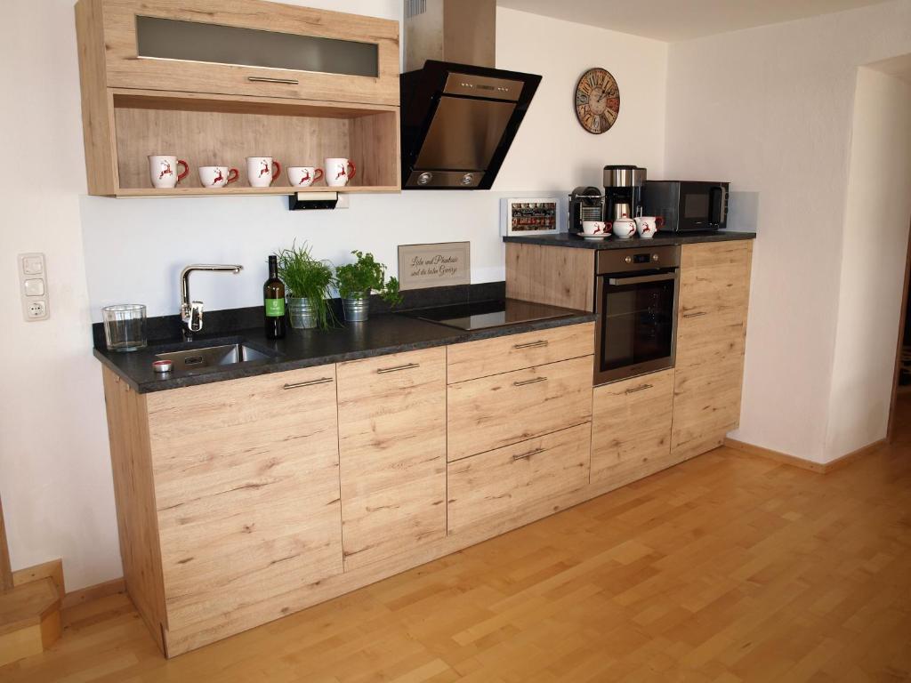 Kuchyň nebo kuchyňský kout v ubytování Ferienwohnung Alpenblick