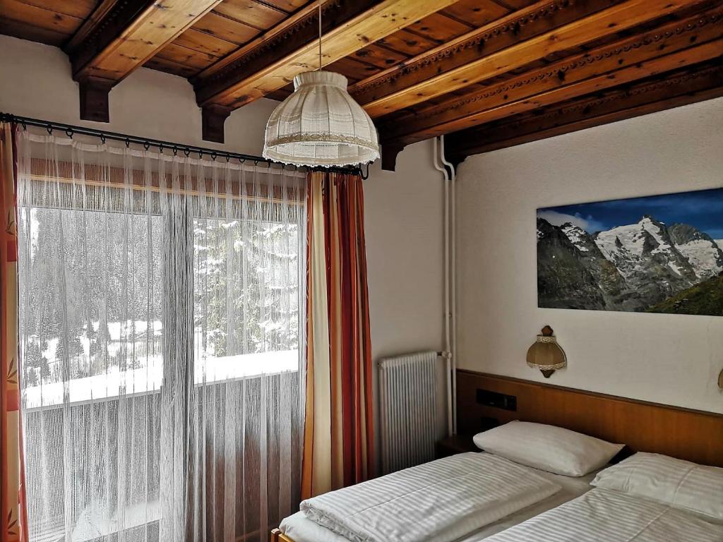 Ένα ή περισσότερα κρεβάτια σε δωμάτιο στο Hotel Rupertihaus