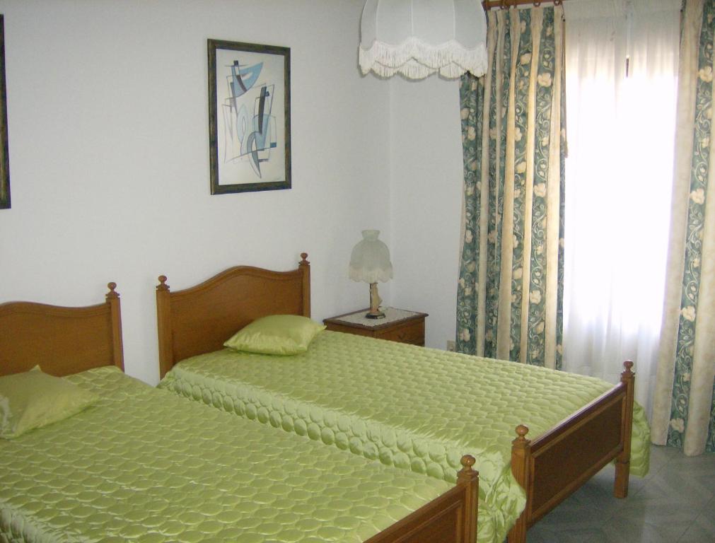 Postel nebo postele na pokoji v ubytování Casa Belmira