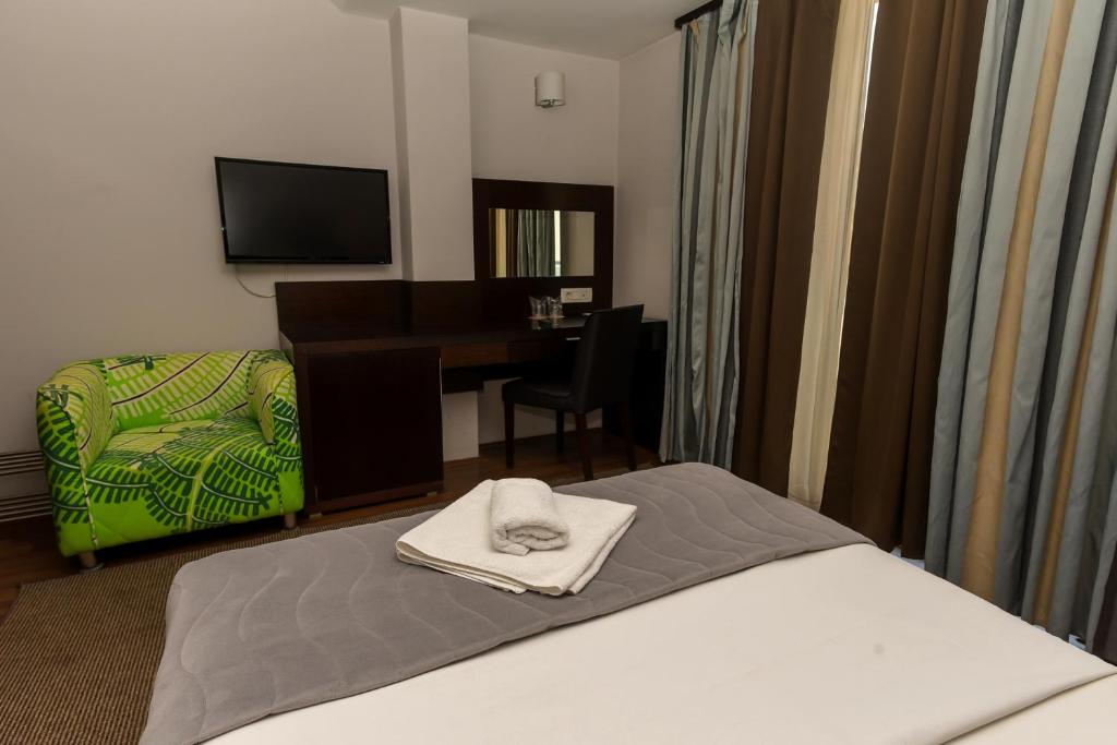 Postel nebo postele na pokoji v ubytování Hotel Dolce International