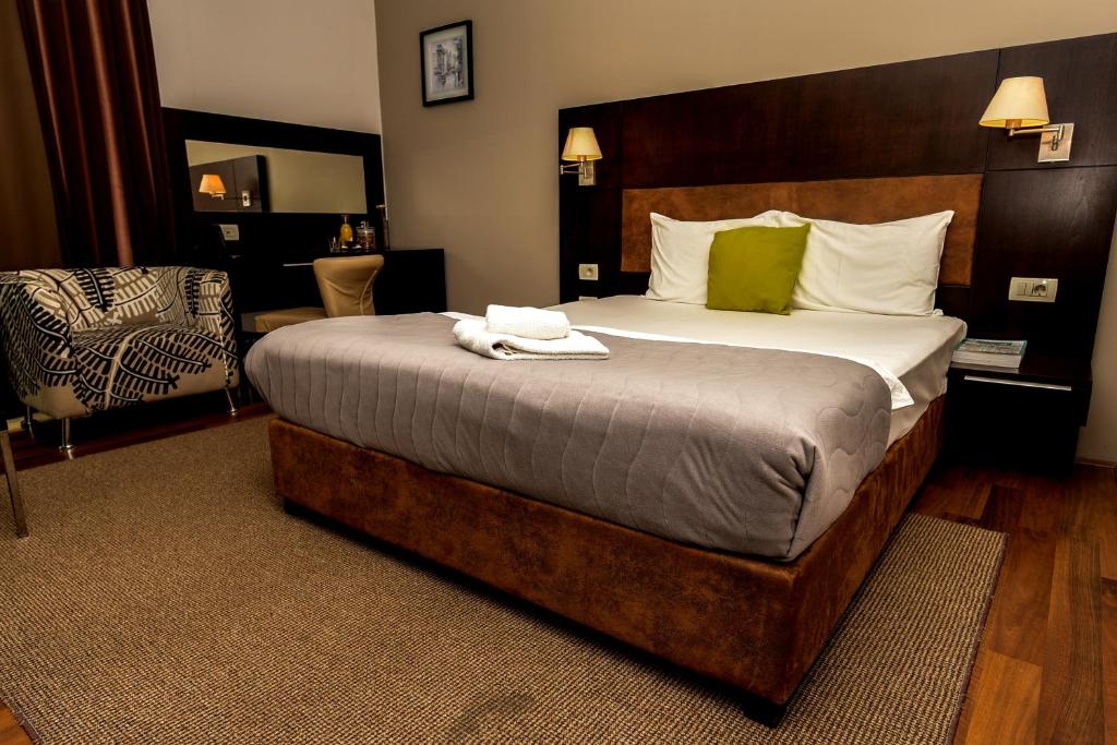 Postel nebo postele na pokoji v ubytování Hotel Dolce International