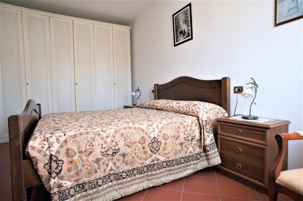 Łóżko lub łóżka w pokoju w obiekcie Casa delle Palme