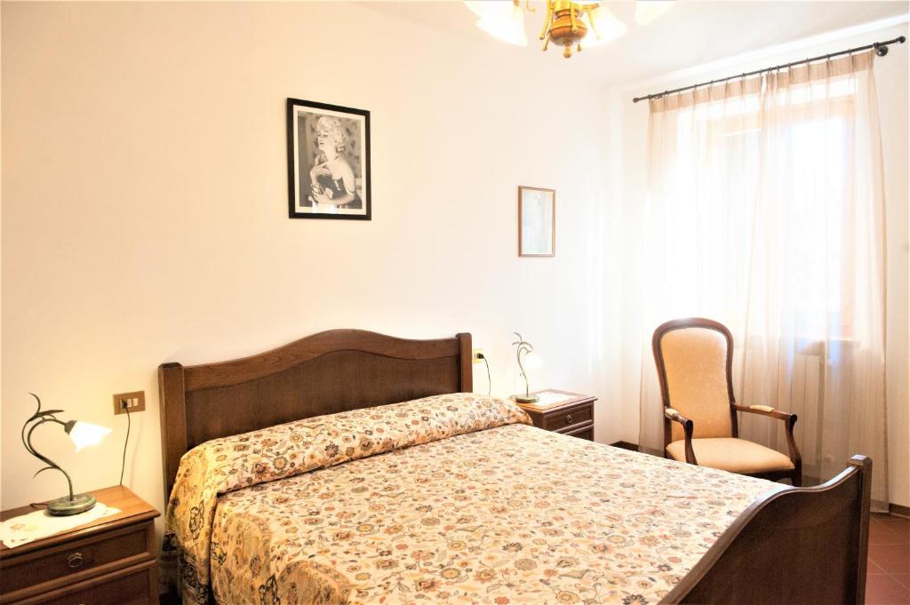 Łóżko lub łóżka w pokoju w obiekcie Casa delle Palme