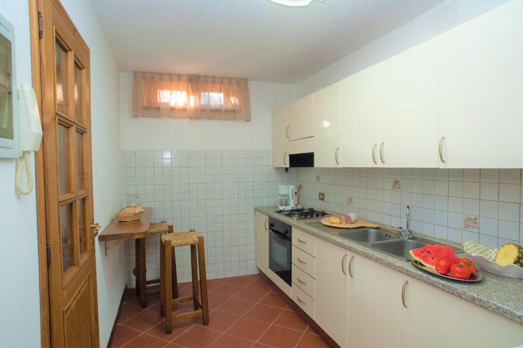 Kuchnia lub aneks kuchenny w obiekcie Casa delle Palme